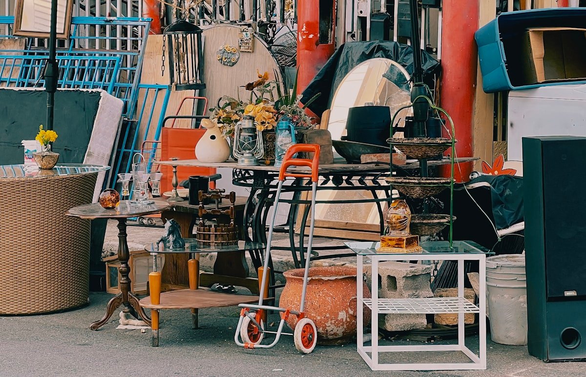 Garage sale tables with leftover items ready for pickup
